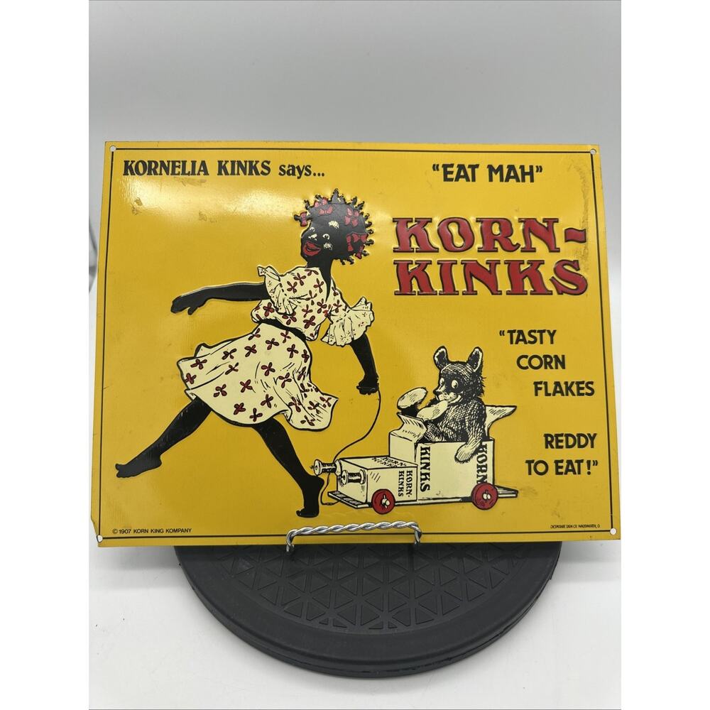 Korn Kinks “Eat Mah” Tasty Corn Flakes Metal Advertising Sign USA 12” x 9” VTG